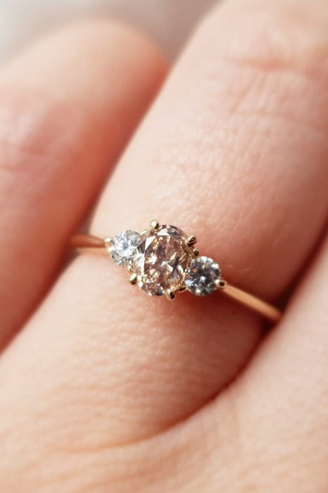 Oval and Round Diamonds Trilogy Ring